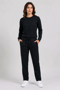 Woman wearing plain black tracksuit front view